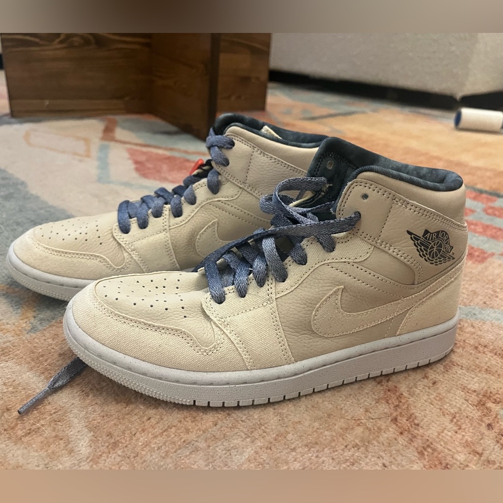 Never worn Jordans. Cream colored with blue tie dye details